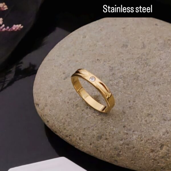 Elegant Wave Design Ring with Sparkling Stone Accent