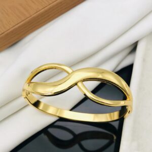 Infinity Twist Bangle – Symbol of Eternal Elegance
