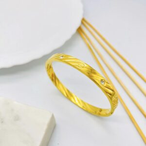 Twist Engraved Bangle with Crystal Accents – Elegant Modern Look no
