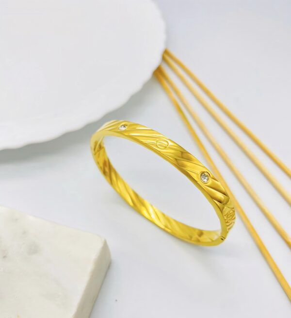 Twist Engraved Bangle with Crystal Accents – Elegant Modern Look no