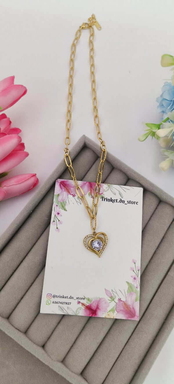 Elegant Heart Pendant Necklace with Dazzling Center Stone
